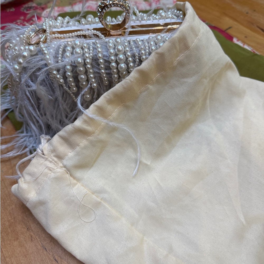 Elegant Pearl and Feather Clutch
